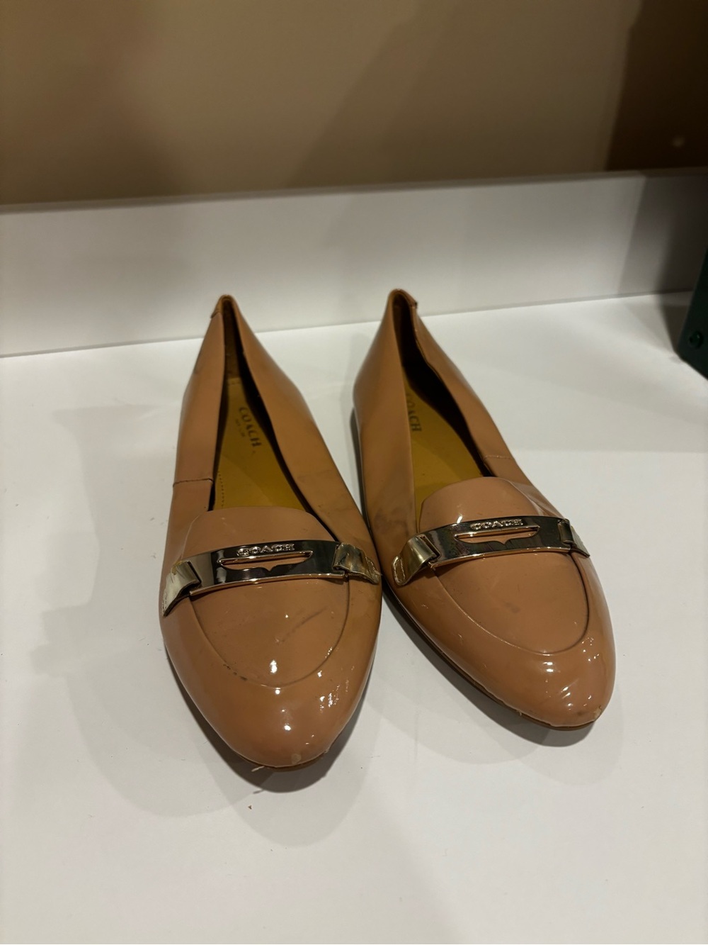 Coach Patent Leather Pointed Toe Loafers in Nude Tan